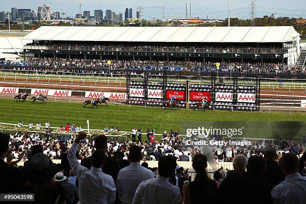 Jockey Craig Newitt riding Tarzino wins race 7 The AAMI Victorian Derby on Derby Day at Flemington Racecourse on October 31, 2015 in Melbourne,...