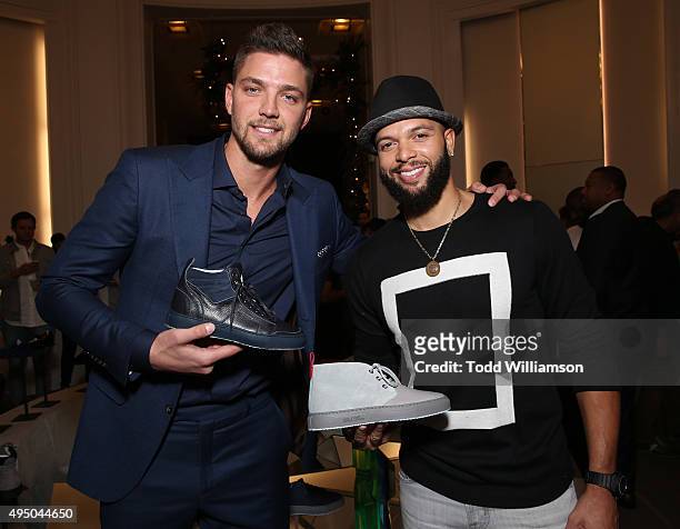 Chandler Parsons and Deron Williams attend a Del Toro Chandler Parsons Event at Saks Fifth Avenue Beverly Hills on October 30, 2015 in Beverly Hills,...