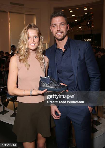 Toni Garrn and Chandler Parsons attend a Del Toro Chandler Parsons Event at Saks Fifth Avenue Beverly Hills on October 30, 2015 in Beverly Hills,...