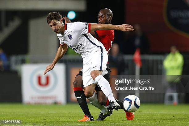 Benjamin Stambouli of PSG and Yacouba Sylla of Rennes in action during the French Ligue 1 match between Stade Rennais and Paris Saint-Germain at...
