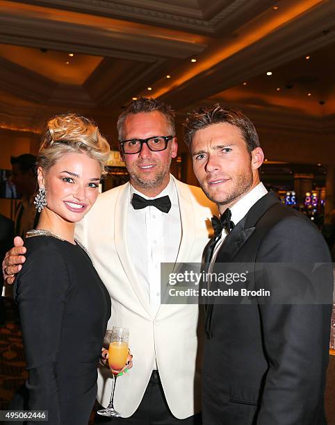 Actress Emma Rigby, celebrity photographer Steve Shaw and actor Scott Eastwood attend the Trick or Treats! pre dinner cocktail party at the high...