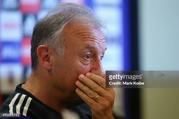 Japan head coach Alberto Zaccheroni looks on as he listens to questions from the media during a press conference at the Hyatt Regency Clearwater...