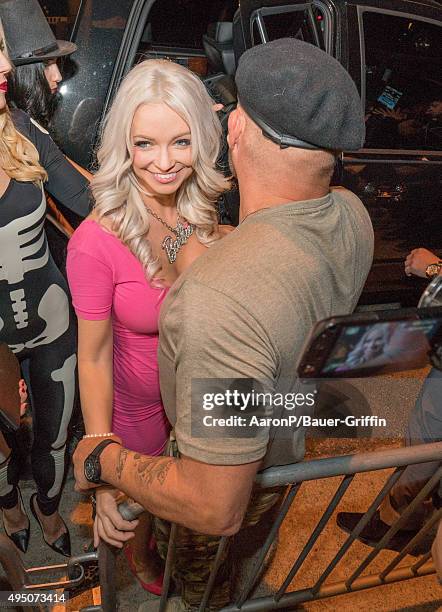 Mindy Robinson and Randy Couture are seen celebrating Halloween in Beverly Hills on October 30, 2015 in Los Angeles, California.