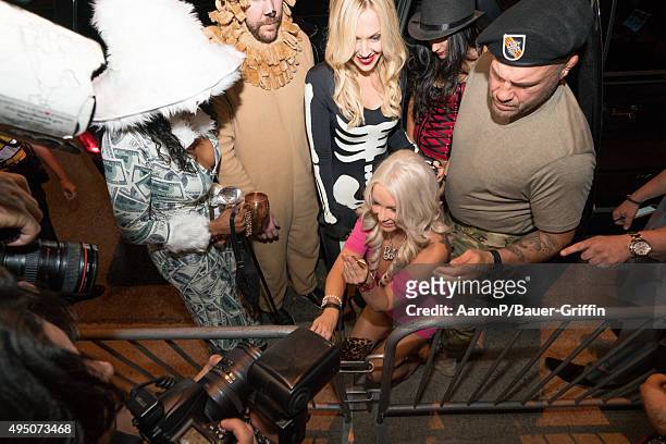Mindy Robinson and Randy Couture are seen celebrating Halloween in Beverly Hills on October 30, 2015 in Los Angeles, California.
