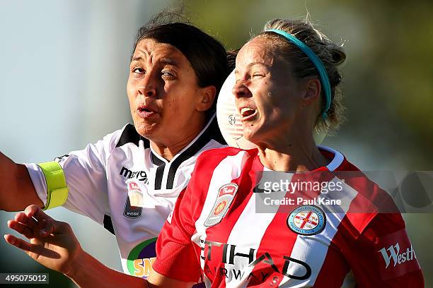 Samantha Kerr of the Glory and Aivi Luik of City contest a header during the round three W-League match between Perth Glory and Melbourne City FC at...