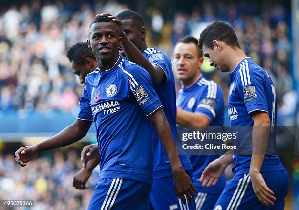 Ramires of Chelsea celebrates scoring his team's first goal with his team mates during the Barclays Premier League match between Chelsea and...
