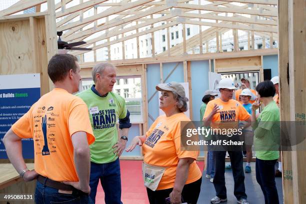 Now in its final day, Gubernatorial Candidate Bruce Rauner , stopped by Habitat for Humanity 'Raise Your Hand Chicagoland' where volunteers built...