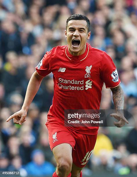 Philippe Coutinho of Liverpool celebrates after scoring during the Barclays Premier League match between Chelsea and Liverpool at Stamford Bridge on...