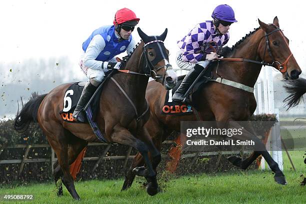 Wayne Hutchinson riding Last Supper and Brian Hughes riding Intense Tango competing in the hurdle in the olbg.com Mares' Hurdle Race on October 31,...