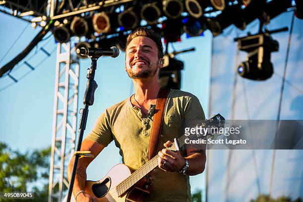 Eric Gunderson of Love and Theft performs during the 2014 WYCD Downtown Hoedown at Comerica Park on May 31, 2014 in Detroit, Michigan.