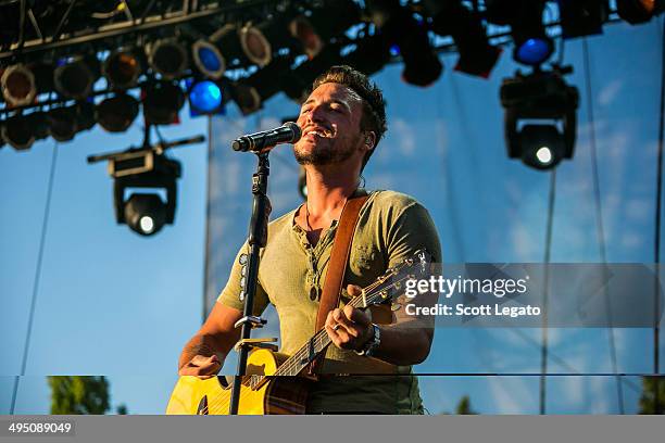 Eric Gunderson of Love and Theft performs during the 2014 WYCD Downtown Hoedown at Comerica Park on May 31, 2014 in Detroit, Michigan.