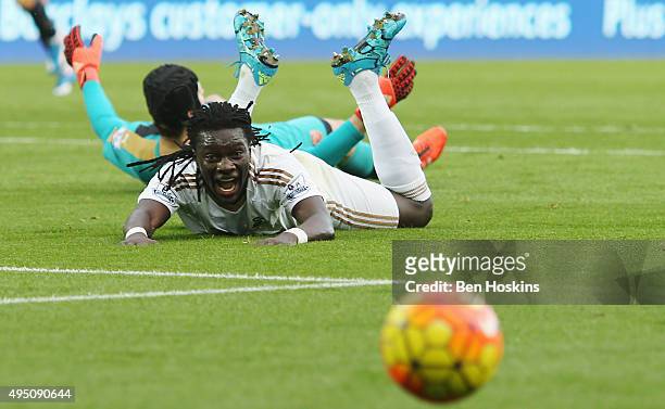 Bafetimbi Gomis of Swansea City reacts after brought down by Petr Cech of Arsenal during the Barclays Premier League match between Swansea City and...