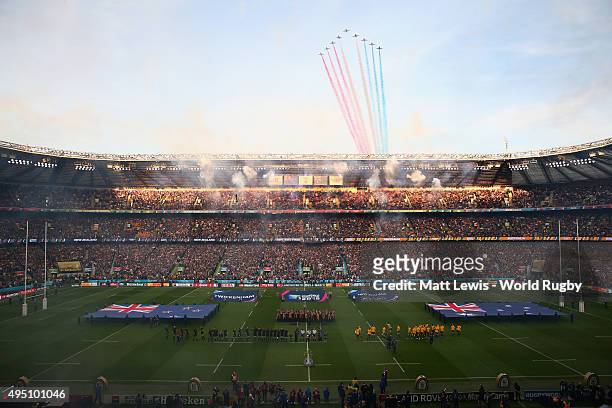 The New Zealand All Blacks and Australia teams line up for the national anthems as the red arrows fly overhead prior to the 2015 Rugby World Cup...