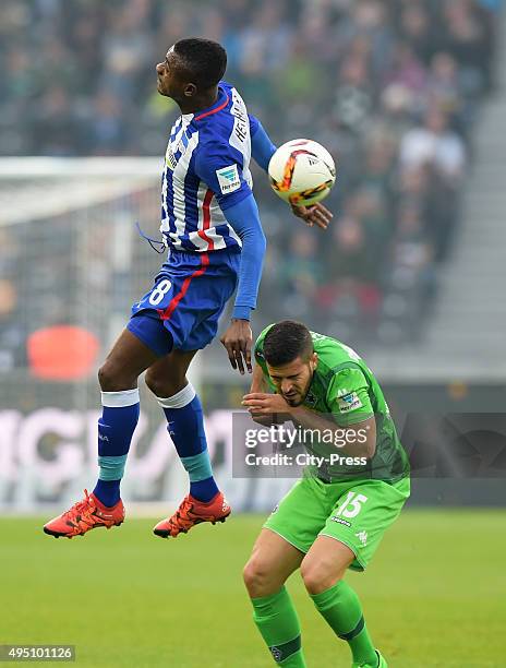 Salomon Kalou of Hertha BSC and Alvaro Dominguez of Borussia Moenchengladbach during the game between Hertha BSC and Borussia Moenchengladbach on...