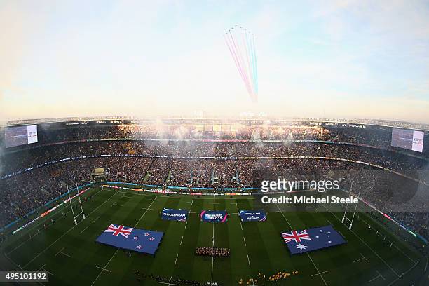 The New Zealand All Blacks and Australia teams line up for the national anthems as the red arrows fly overhead prior to the 2015 Rugby World Cup...