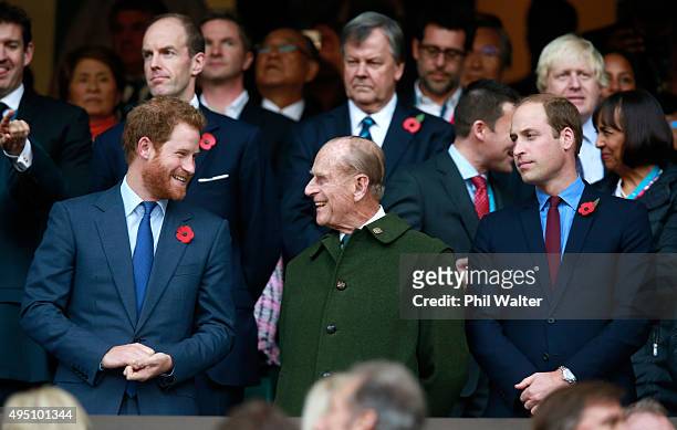 Prince Harry, Prince Phillip and Prince William enjoy the atmosphere during the 2015 Rugby World Cup Final match between New Zealand and Australia at...