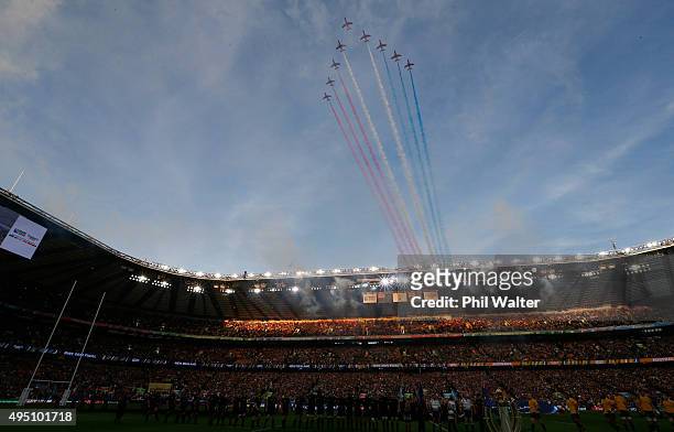 The Red Arrows perform a fly pass ahead of the 2015 Rugby World Cup Final match between New Zealand and Australia at Twickenham Stadium on October...