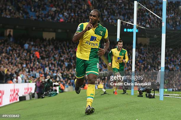 Cameron Jerome of Norwich City celebrates scoring his team's first goal during the Barclays Premier League match between Manchester City and Norwich...