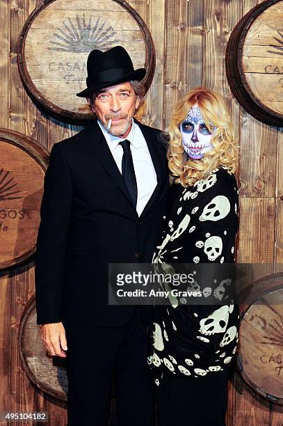 Todd Morgan and Rosanna Arquette attend the Casamigos Tequila Halloween Party Brought to you by Those Who Drink It at a private residence on October...