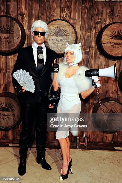 Josh Duhamel and Stacy Ann Ferguson attend the Casamigos Tequila Halloween Party Brought to you by Those Who Drink It at a private residence on...