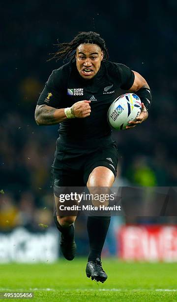 Ma'a Nonu of New Zealand breaks through on his way to score his team's second try during the 2015 Rugby World Cup Final match between New Zealand and...