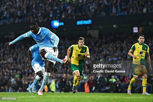 Yaya Toure of Manchester City scores his team's second goal from the penalty spot during the Barclays Premier League match between Manchester City...