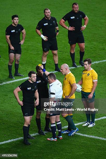 Ben Smith of the New Zealand All Blacks is shown a yellow card and sent to the sin bin by Referee Nigel Owens during the 2015 Rugby World Cup Final...