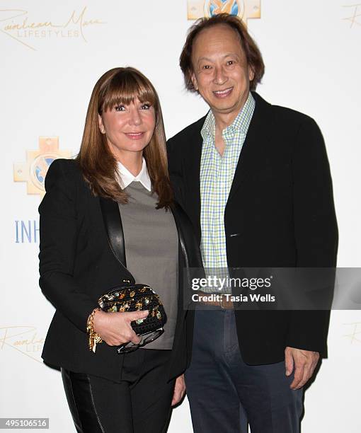 Journalist Ana Garcia and Ming Fu arrive at a charity event for Inkarri on October 24, 2015 in Beverly Hills, California.