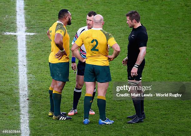 Referee Nigel Owens talks with both captains Richie McCaw of the New Zealand All Blacks and Stephen Moore of Australia as well as Sekope Kepu during...