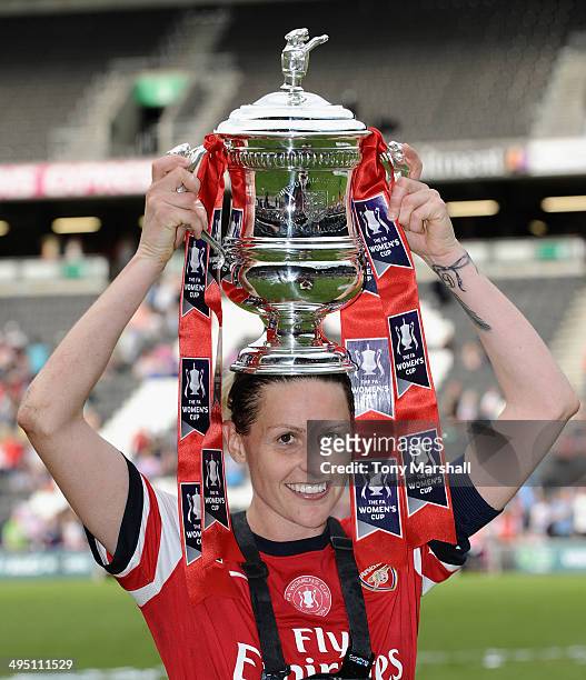 Kelly Smith of Arsenal Ladies celebrates with the trophy after winning the FA Women's Cup Final match between Everton Ladies and Arsenal Ladies at...