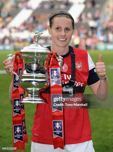 Kelly Smith of Arsenal Ladies celebrates with the trophy after winning the FA Women's Cup Final match between Everton Ladies and Arsenal Ladies at...