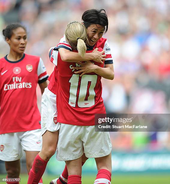 Yukari Kinga celebrates scoring the 2nd Arsenal goal with Kelly Smith during the match at Stadium mk on June 1, 2014 in Milton Keynes, England.