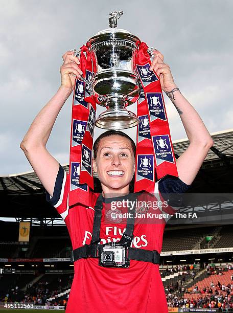 Kelly Smith of Arsenal Ladies poses with the trophy during the FA Women's Cup final between Everton Ladies and Arsenal Ladies at Stadium mk on June...