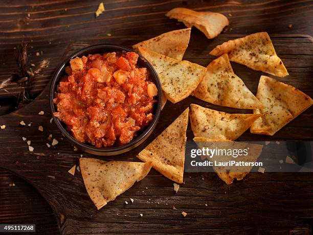 bruschetta with baked pita chips - pita bread stock pictures, royalty-free photos & images