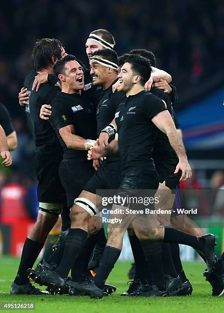 New Zealand All Blacks players celebrate after winning the 2015 Rugby World Cup Final match between New Zealand and Australia at Twickenham Stadium...