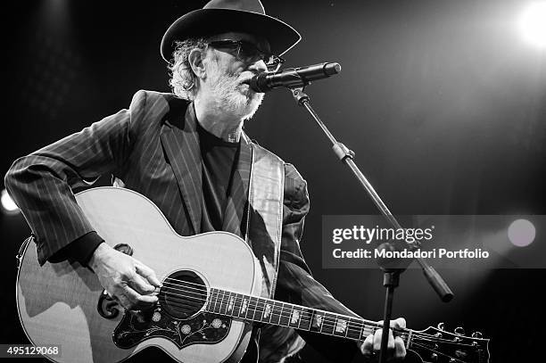 Italian singer-songwriter Francesco De Gregori singing and playing guitar during his concert at Mediolanum Forum in Assago. Milan , 23rd March 2015