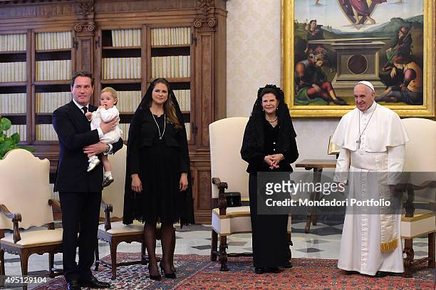 Pope Francis holding an audience to receive the Queen Silvia of Sweden, Princess Madeleine and husband Christopher O'Neill and the little Princess...