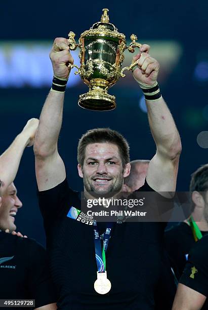 Victorious captain Richie McCaw of New Zealand lifts the Webb Ellis Cup during the 2015 Rugby World Cup Final match between New Zealand and Australia...