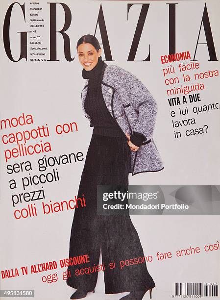 The cover of the weekly magazine Grazia with a model posing. Italy, November 1994