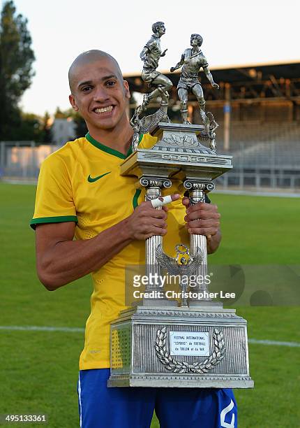 Captain Doria of Brazil celebrates their victory with the trophy during the Final of the Toulon Tournament between France and Brazil at the Parc des...