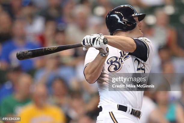 Lyle Overbay of the Milwaukee Brewers hits a triple in the bottom of the third inning against the Chicago Cubs at Miller Park on June 01, 2014 in...