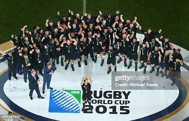 Richie McCaw of the New Zealand All Blacks lifts the Webb Ellis Cup following the victory against Australia in the 2015 Rugby World Cup Final match...