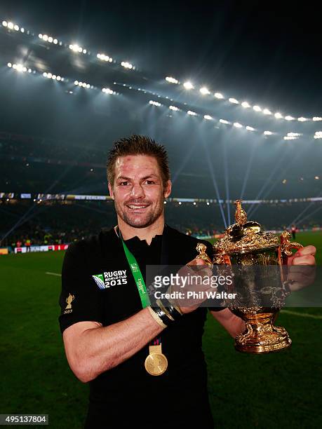 Richie McCaw of New Zealand poses with the Webb Ellis Cup after victory in the 2015 Rugby World Cup Final match between New Zealand and Australia at...