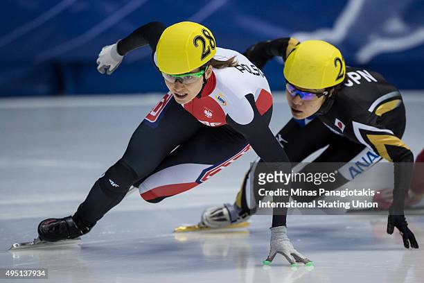 Patrycja Maliszewska of Poland competes against Yui Sakai of Japan in the 1000 meter quarterfinals on Day 1 of the ISU World Cup Short Track Speed...