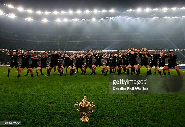 The victorious New Zealand players perform the Haka to celebrate winning the Webb Ellis Cup during the 2015 Rugby World Cup Final match between New...