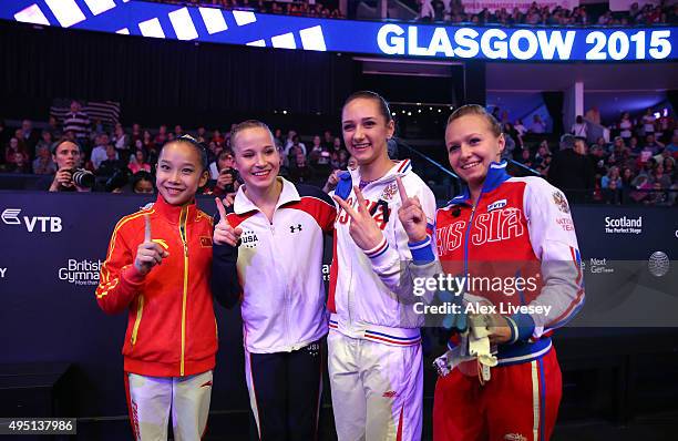 Madison Kocian of USA, Daria Spiridonova of Russia, Viktoriia Komova and Yilin Fan of China all win Gold in the Uneven Bars Final during day nine of...