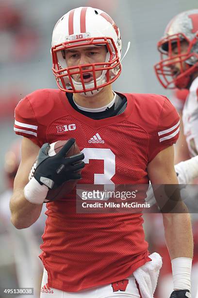 Tanner McEvoy of the Wisconsin Badgers runs in for a touchdown during the second half against the Rutgers Scarlet Knights at Camp Randall Stadium on...