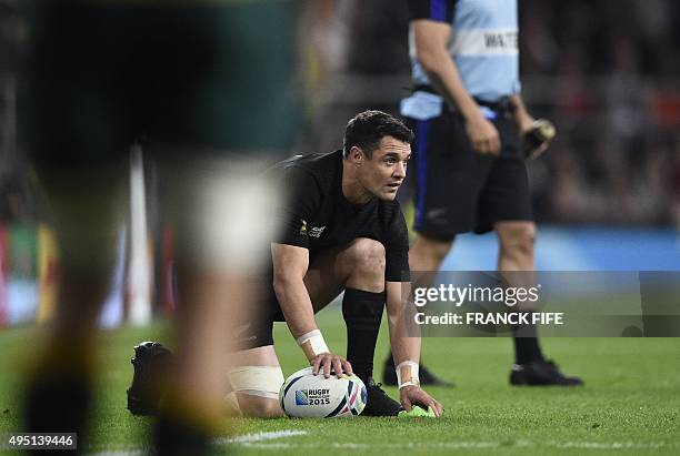 New Zealand's fly half Dan Carter takes a conversion after the first try during the final match of the 2015 Rugby World Cup between New Zealand and...