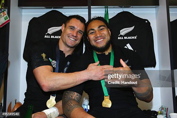 In this handout photograph provided by World Rugby via Getty Images, Dan Carter and Ma'a Nonu of the New Zealand All Blacks pose in the dressing room...