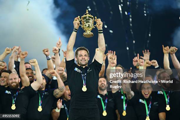 Richie McCaw of the New Zealand All Blacks lifts the Webb Ellis Cup following the victory against Australia in the 2015 Rugby World Cup Final match...